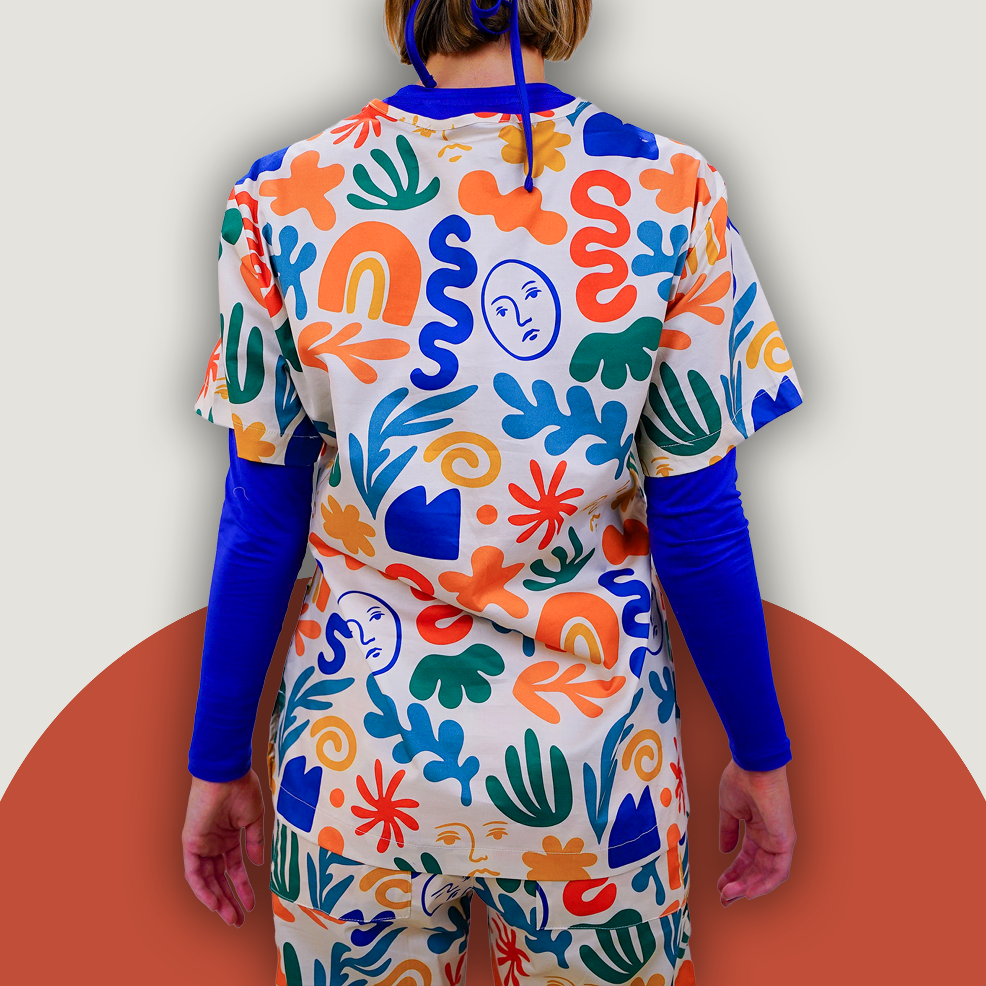 Face the Shapes Repeat Scrub Top